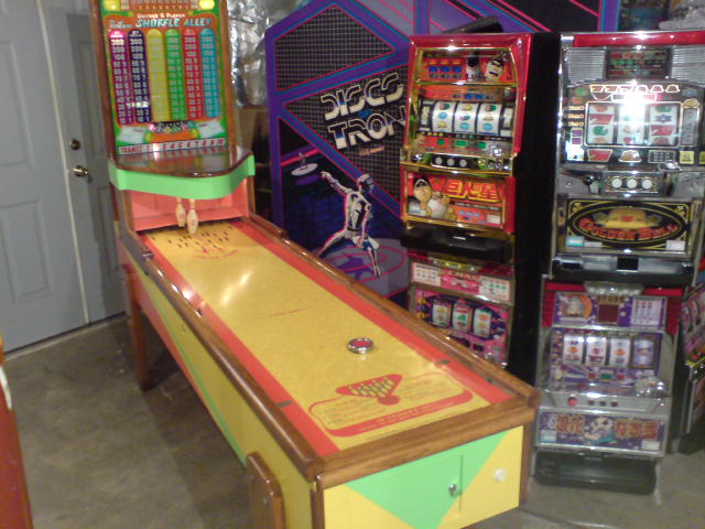 Vintage Bowling Machine, Tron (Sit-Down), and Assorted Slot Machines